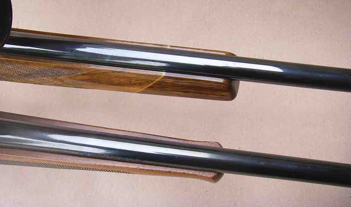 Many sporter-weight rifles feature a small pressure point just behind the forend tip, such as this Weatherby Varmint Master (top) and Winchester Model 70 Featherweight Classic.
